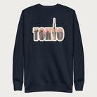 Navy blue sweatshirt with a graphic of Tokyo's skyline integrated within the letters spelling "TOKYO."