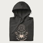 Folded dark grey hoodie with a graphic of a meditating mushroom character and the words 'Stay Fungi' and 'Stay Mindful'.