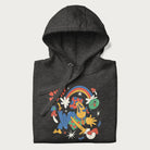 Folded dark grey trippy hoodie featuring a colorful psychedelic design with playful characters and the text "Stay Trippy".