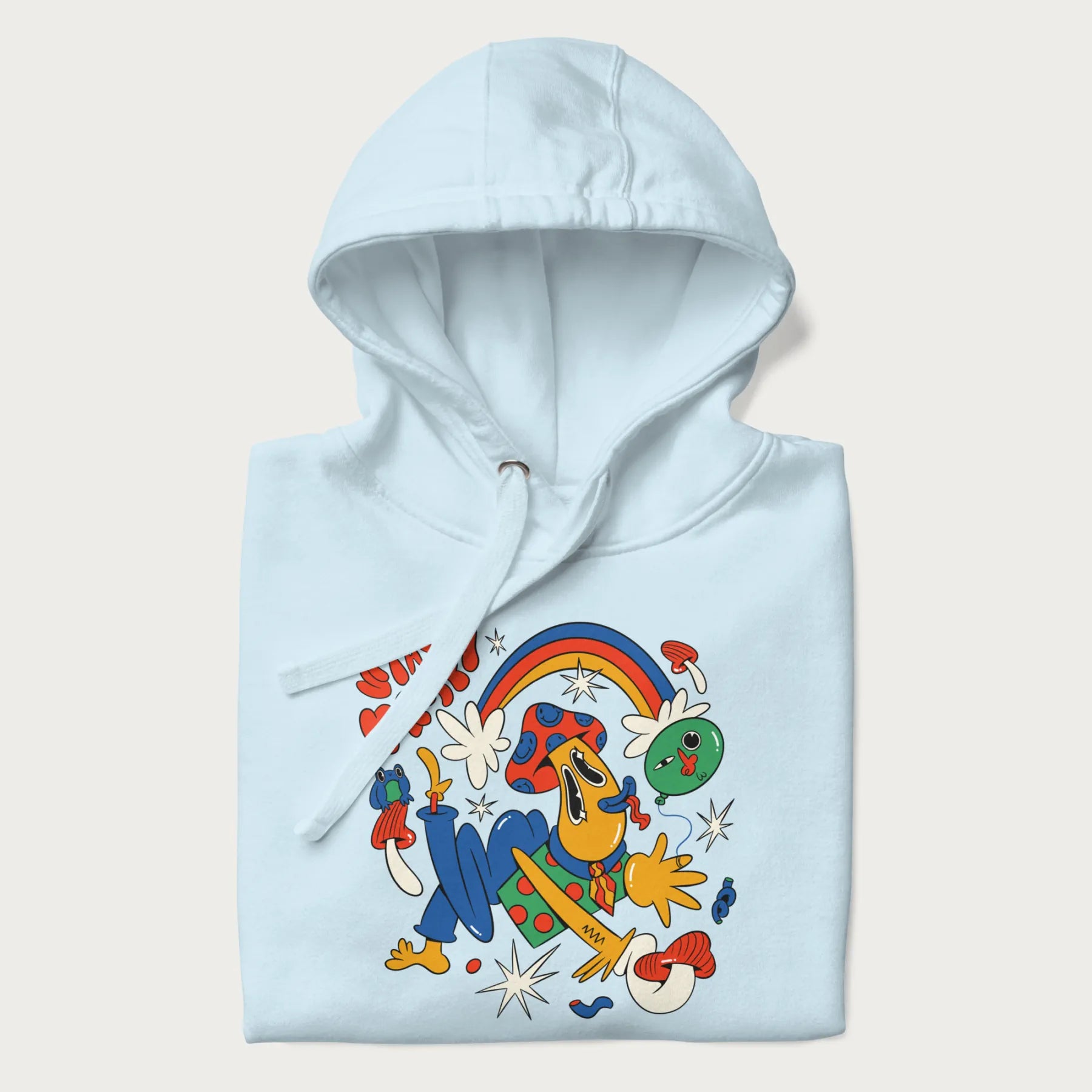 Folded light blue trippy hoodie featuring a colorful psychedelic design with playful characters and the text "Stay Trippy".