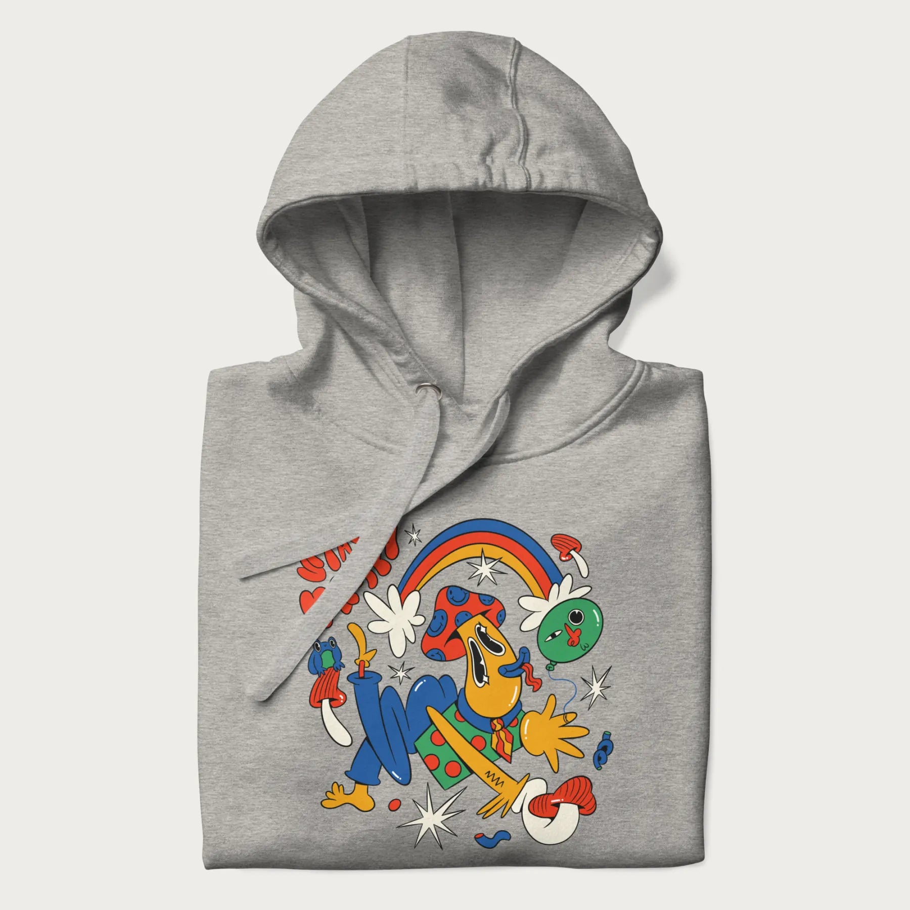 Folded light grey trippy hoodie featuring a colorful psychedelic design with playful characters and the text "Stay Trippy".