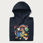 Folded navy blue trippy hoodie featuring a colorful psychedelic design with playful characters and the text "Stay Trippy".