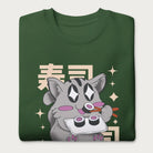 Folded forest green sweatshirt with Japanese text and a kawaii graphic of a cat eating sushi.