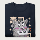 Folded navy blue sweatshirt with Japanese text and a kawaii graphic of a cat eating sushi.