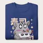 Folded royal blue sweatshirt with Japanese text and a kawaii graphic of a cat eating sushi.