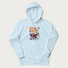 Light blue hoodie with Japanese graphic of a sushi monster over a burning city with Japanese text.