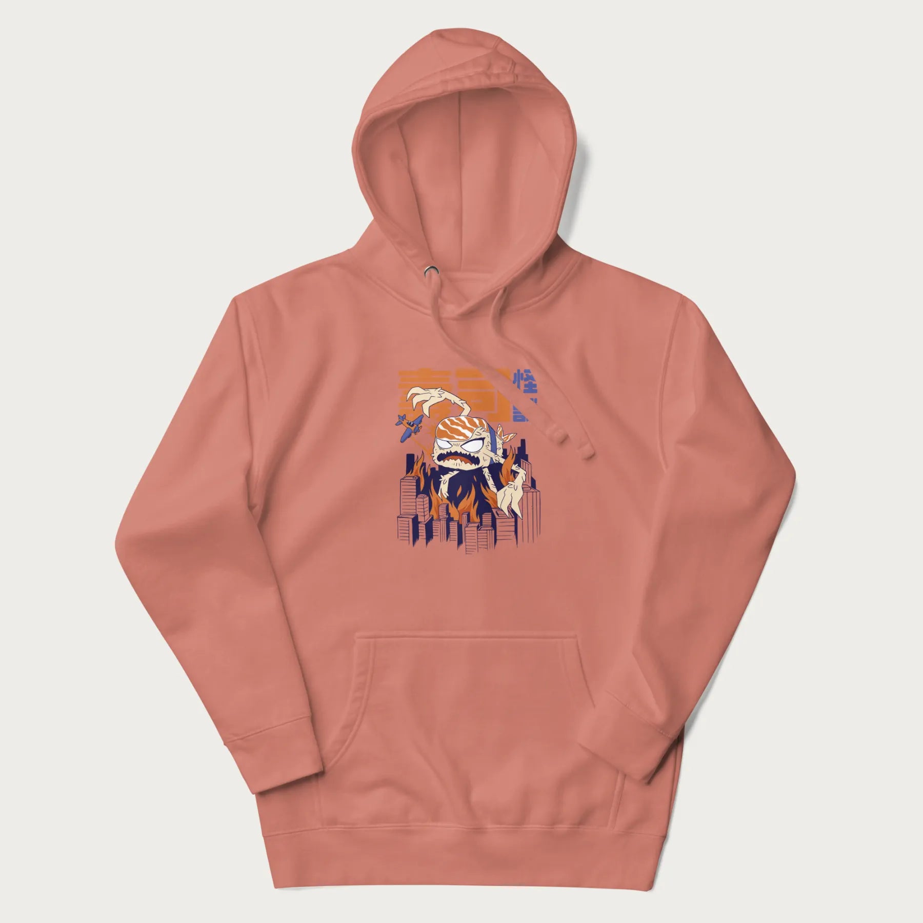 Light pink hoodie with Japanese graphic of a sushi monster over a burning city with Japanese text.