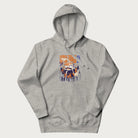 Light grey hoodie with Japanese graphic of a sushi monster over a burning city with Japanese text.