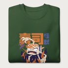 Folded forest green sweatshirt with a graphic of a monstrous sushi roll attacking a city and Japanese text.