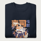 Folded navy blue sweatshirt with a graphic of a monstrous sushi roll attacking a city and Japanese text.