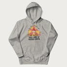 Light grey hoodie with a graphic of a happy red mushroom, sunburst background, and the text 'Take Care of Mother Earth'.