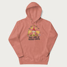 Light pink hoodie with a graphic of a happy red mushroom, sunburst background, and the text 'Take Care of Mother Earth'.