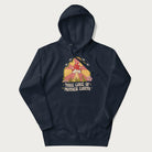 Navy blue hoodie with a graphic of a happy red mushroom, sunburst background, and the text 'Take Care of Mother Earth'.