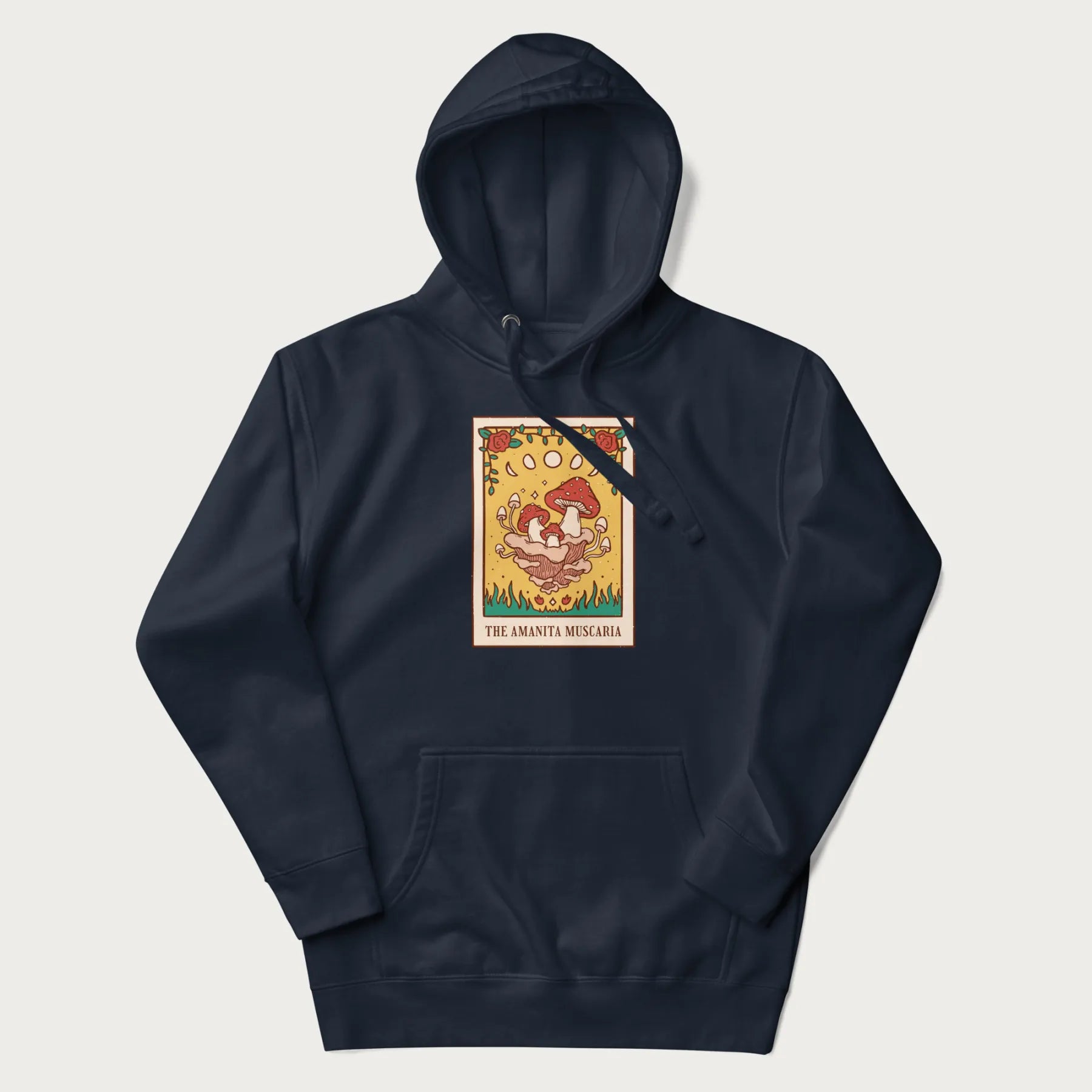 Navy blue hoodie featuring a graphic of Amanita Muscaria mushrooms with floral accents and moon phases, resembling a tarot card.