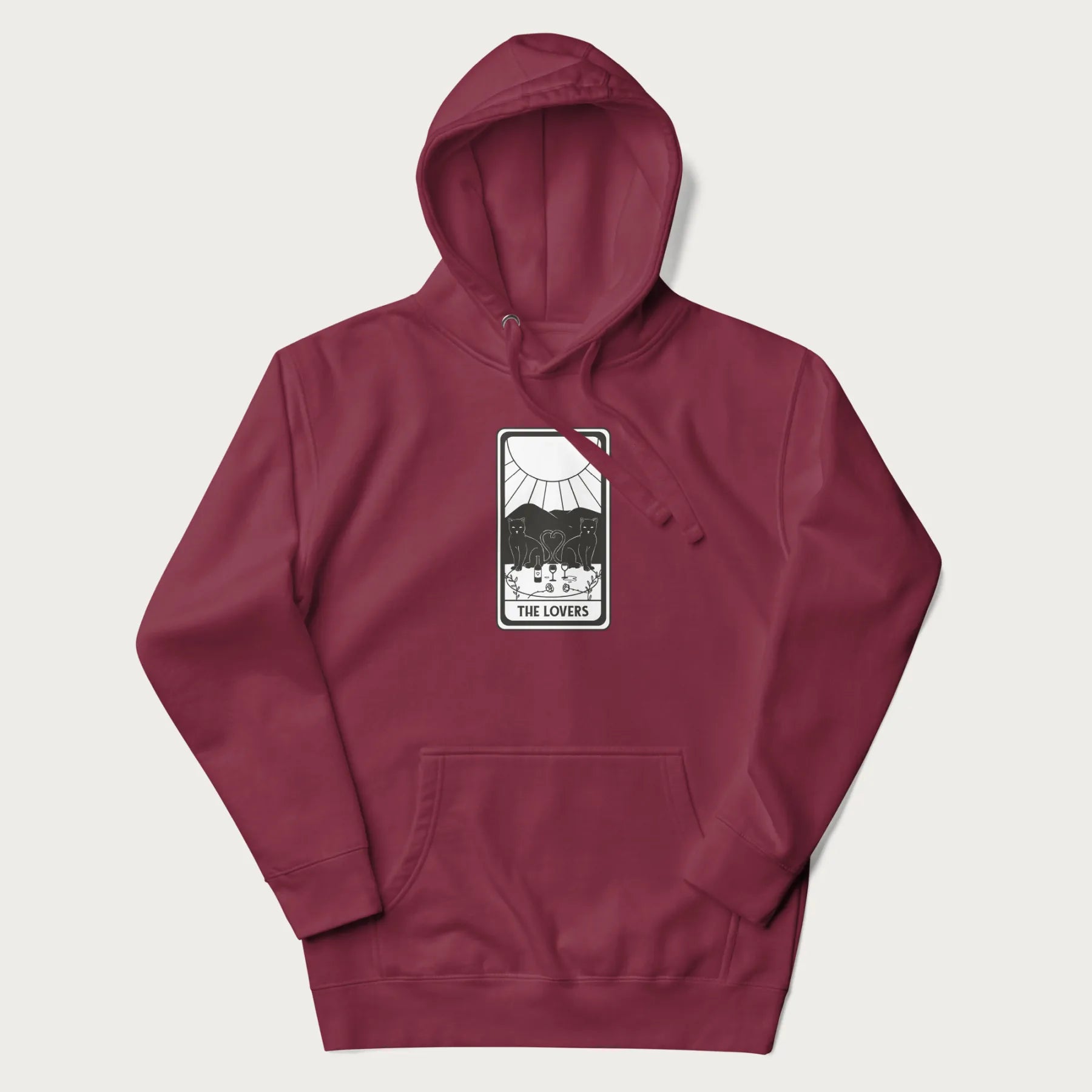 Maroon hoodie with a 'The Lovers' tarot card graphic of two cats with intertwined tails forming a heart, wine, and roses.