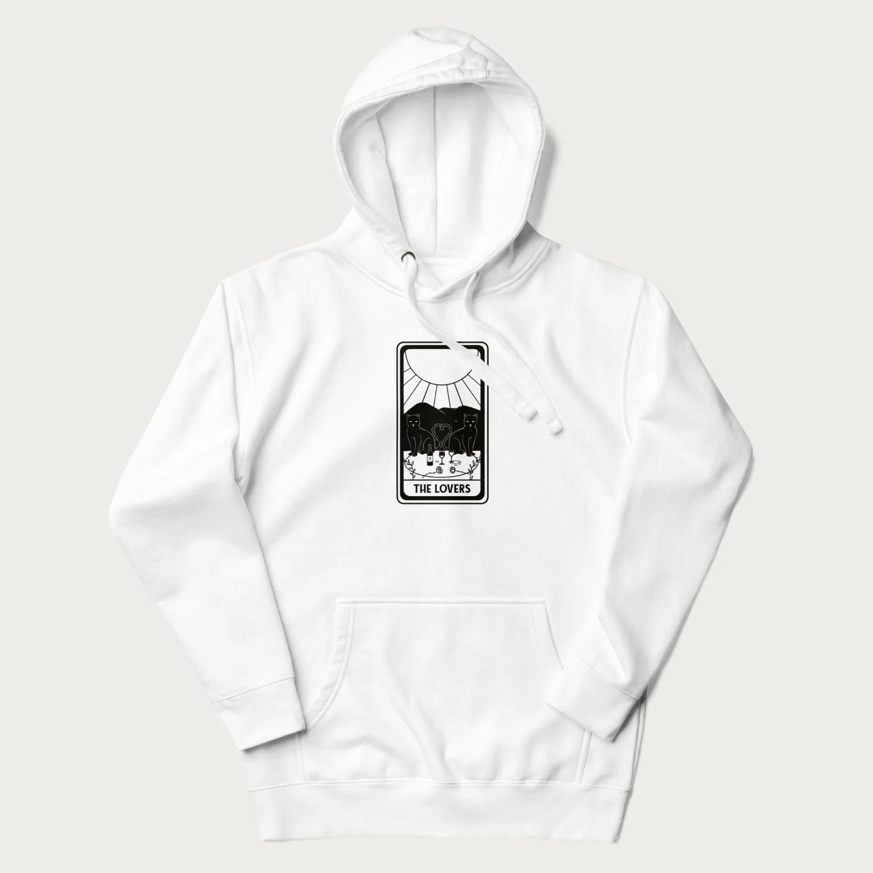 White hoodie with a 'The Lovers' tarot card graphic of two cats with intertwined tails forming a heart, wine, and roses.