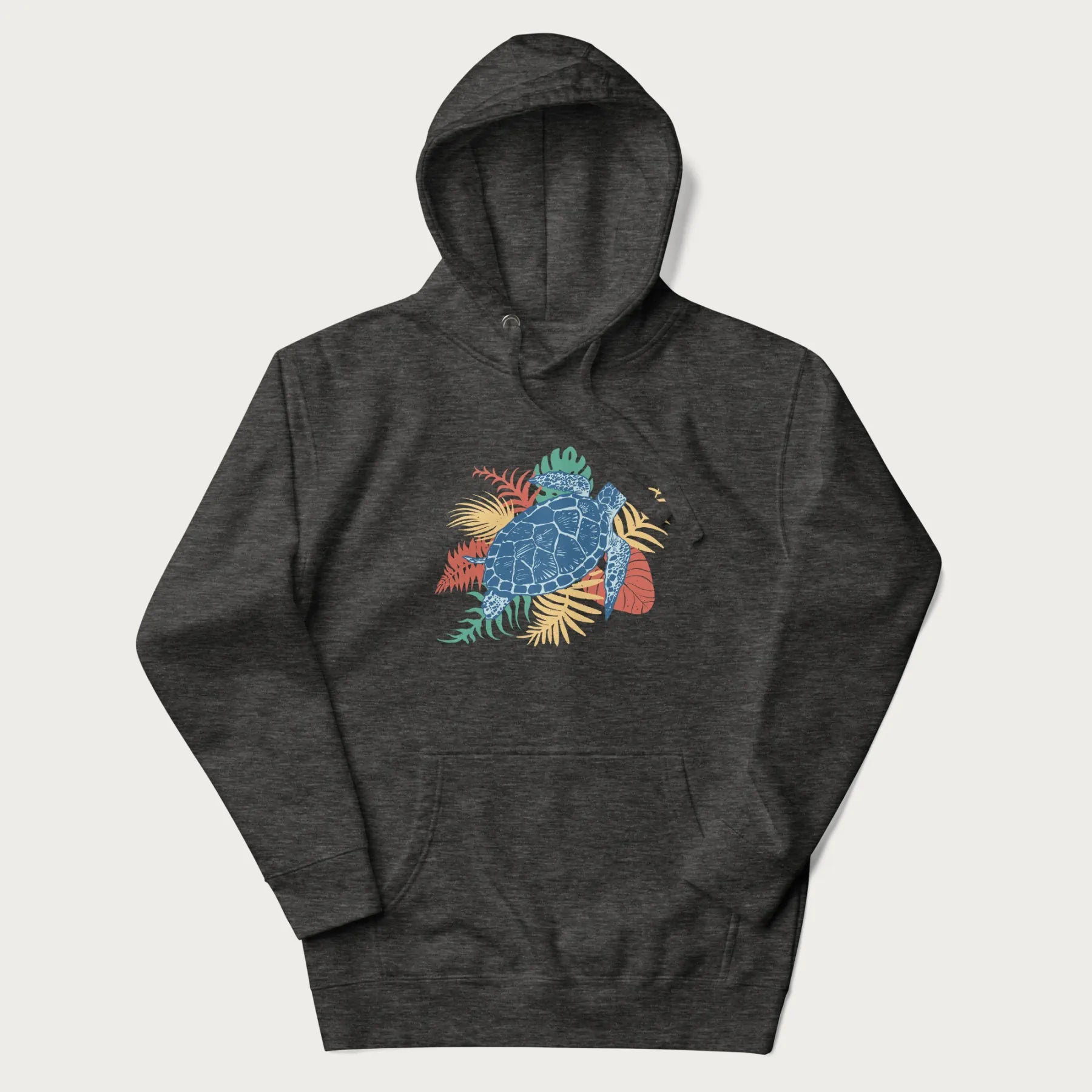 Dark grey hoodie with a vibrant graphic of a blue sea turtle and colorful tropical leaves.