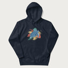 Navy blue hoodie with a vibrant graphic of a blue sea turtle and colorful tropical leaves.