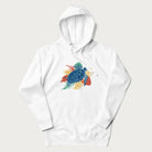 White hoodie with a vibrant graphic of a blue sea turtle and colorful tropical leaves.