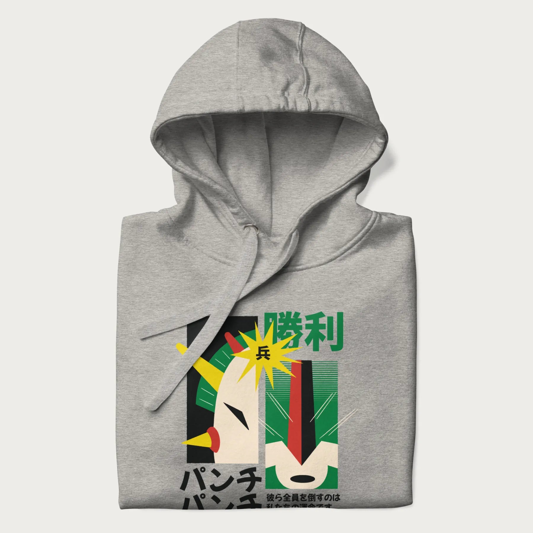 Folded light grey hoodie with Japanese text and a graphic of a retro-futuristic robot fighter, inspired by Japanese mecha art.