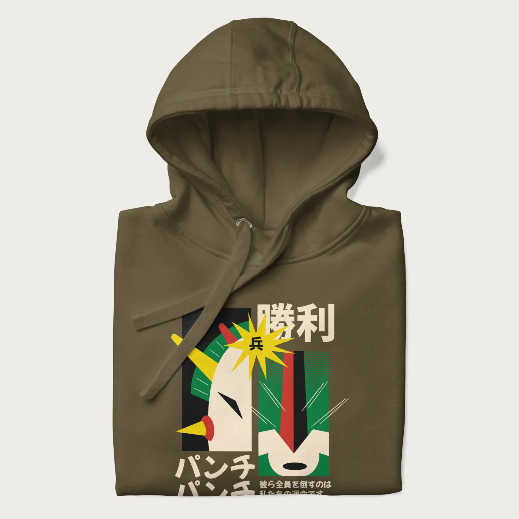 Folded military green hoodie with Japanese text and a graphic of a retro-futuristic robot fighter, inspired by Japanese mecha art.