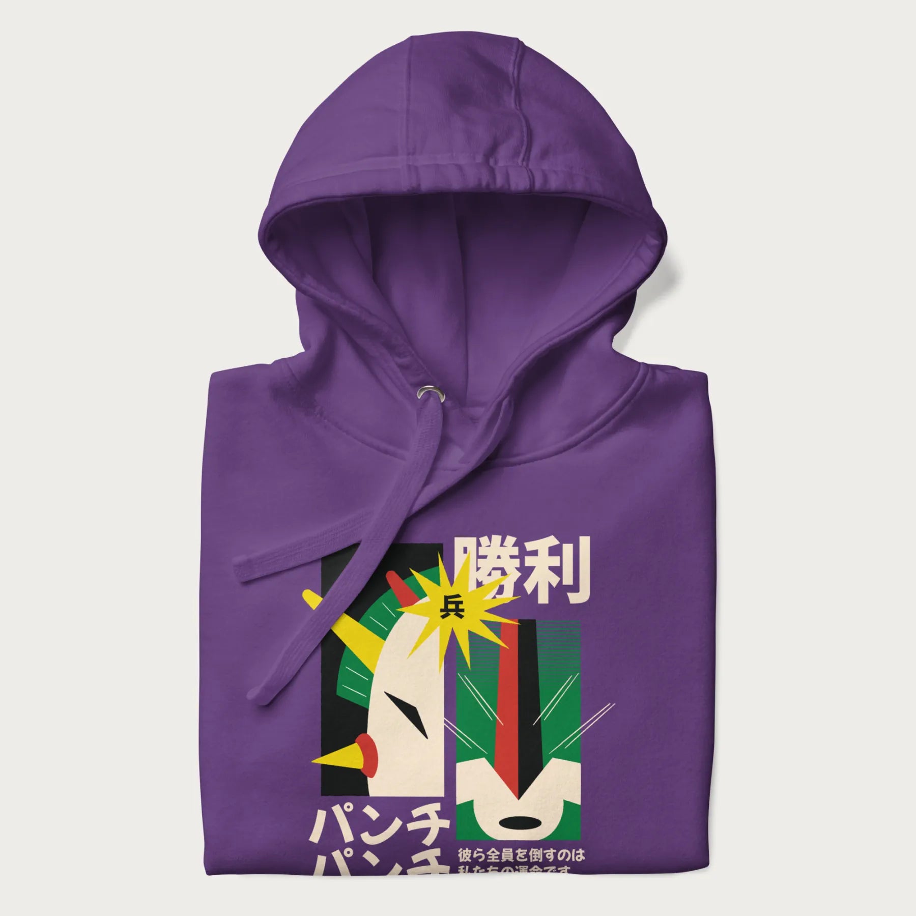 Folded purple hoodie with Japanese text and a graphic of a retro-futuristic robot fighter, inspired by Japanese mecha art.