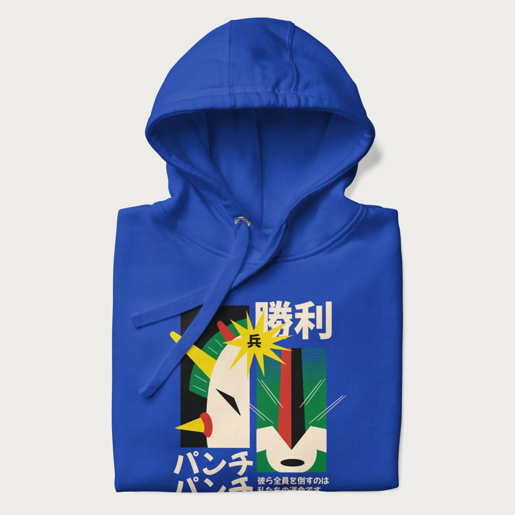 Folded royal blue hoodie with Japanese text and a graphic of a retro-futuristic robot fighter, inspired by Japanese mecha art.