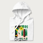 Folded white hoodie with Japanese text and a graphic of a retro-futuristic robot fighter, inspired by Japanese mecha art.