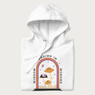 Folded white hoodie with graphic of mystical mushrooms with an all-seeing eye and the text 'Wisdom Begins in Wonder' framed by a rainbow arch.