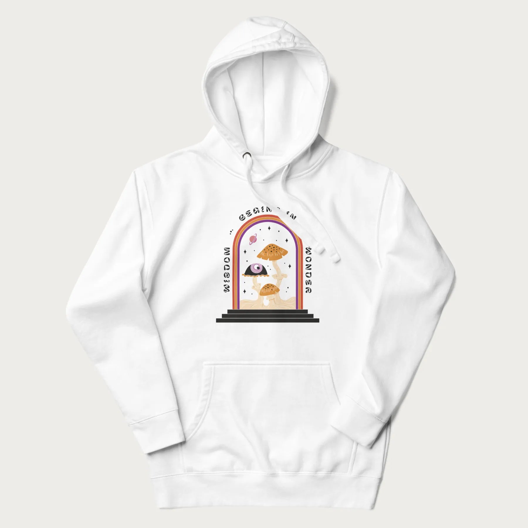 White hoodie with graphic of mystical mushrooms with an all-seeing eye and the text 'Wisdom Begins in Wonder' framed by a rainbow arch.