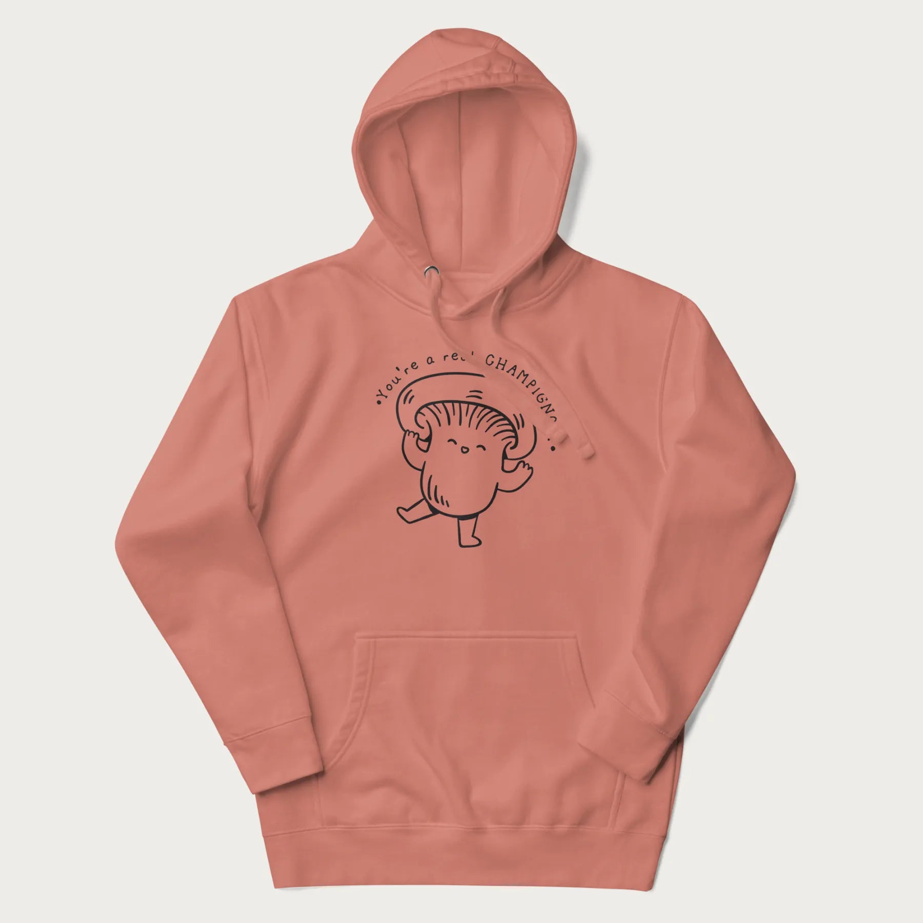 Light pink hoodie with a cute champignon mushroom graphic and the text "You're a Real Champignon!"