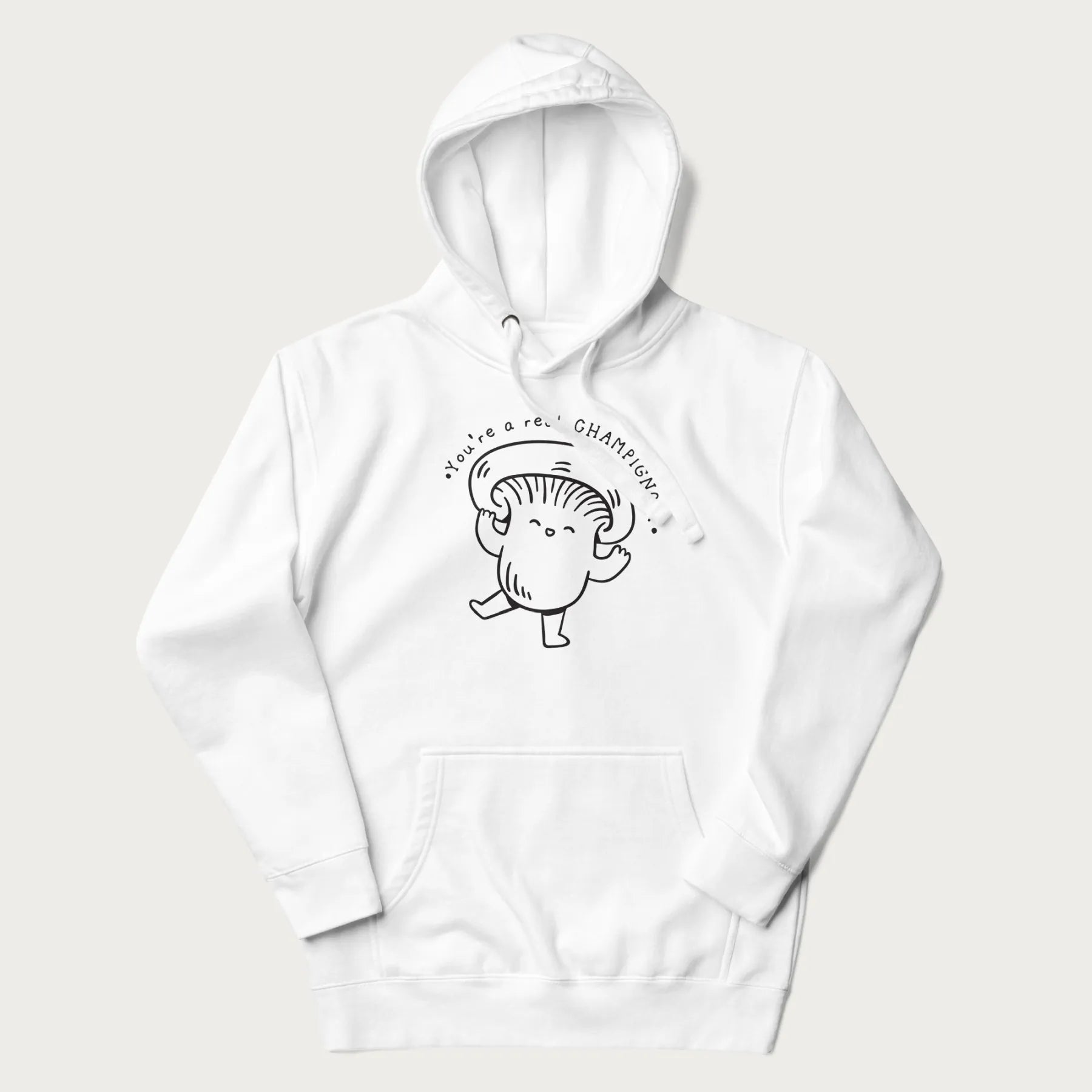 White hoodie with a cute champignon mushroom graphic and the text "You're a Real Champignon!"