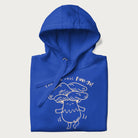 Folded royal blue hoodie with graphic of a cute mushroom joyfully dancing with the text "You're a Real Fun-gi!"