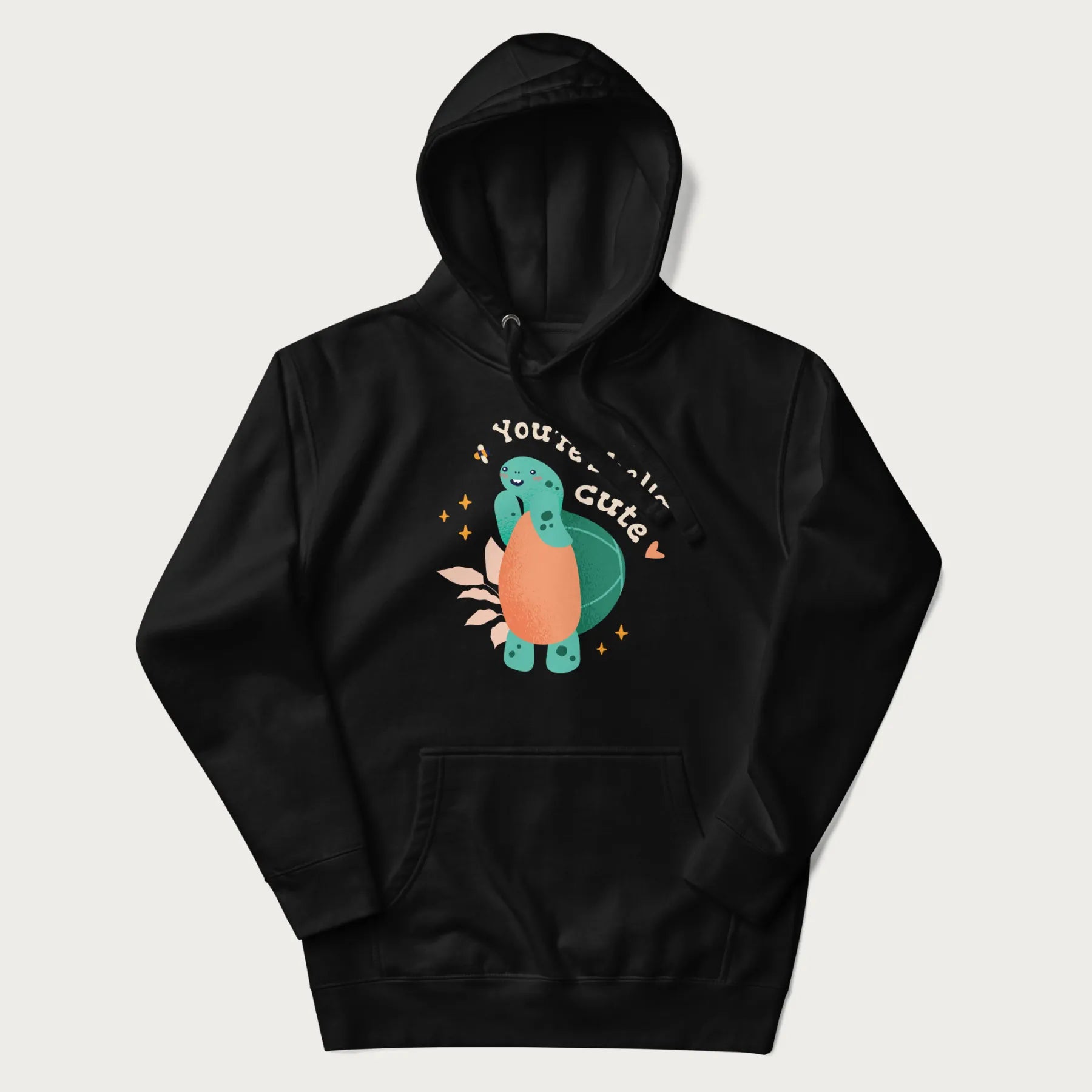 Black hoodie with a cute turtle graphic and the text 'You're Shella Cute' above.