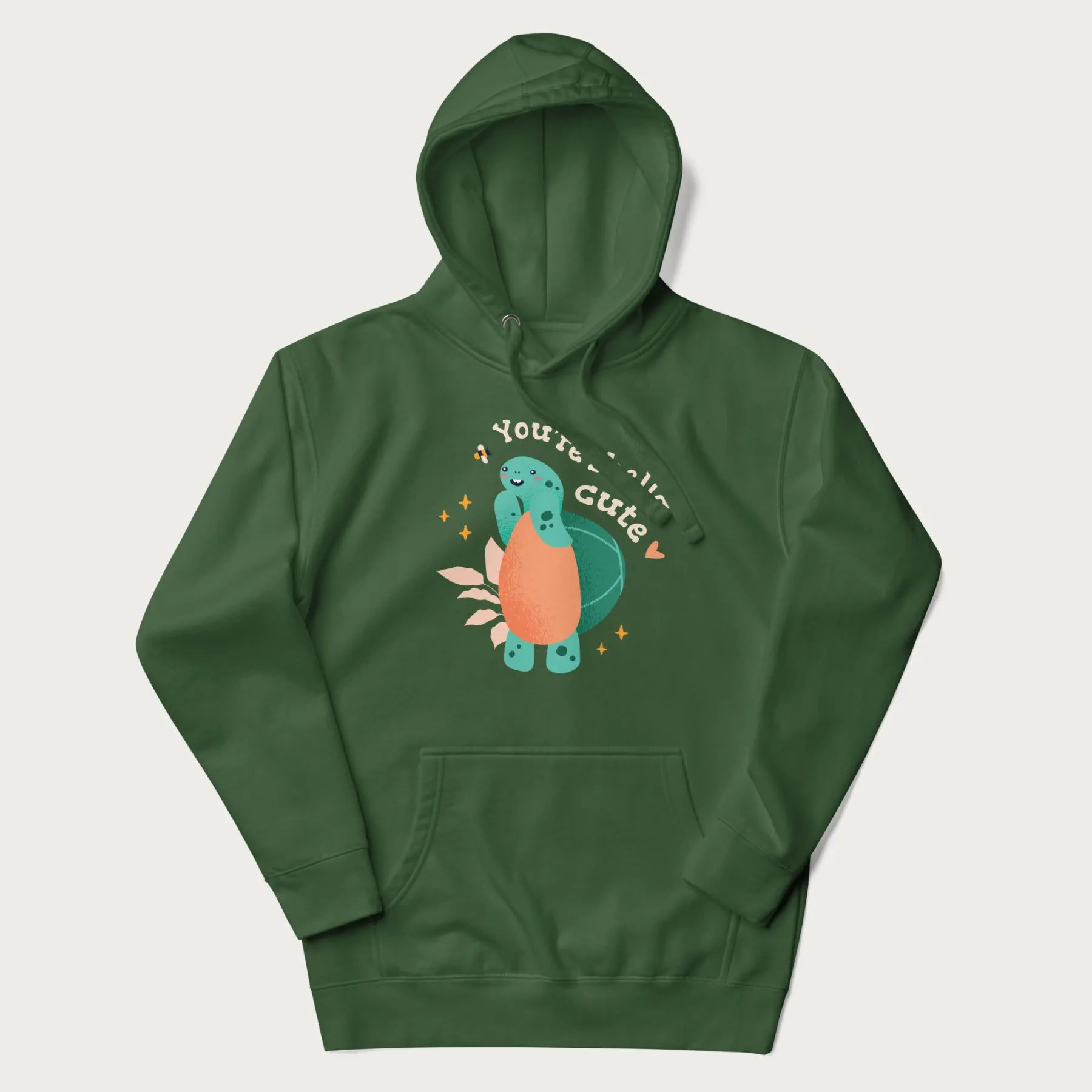 Forest green hoodie with a cute turtle graphic and the text 'You're Shella Cute' above.