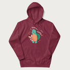 Maroon hoodie with a cute turtle graphic and the text 'You're Shella Cute' above.